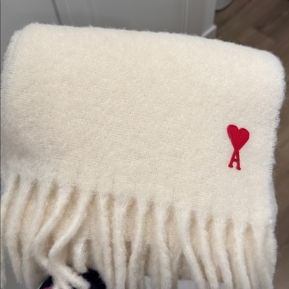 Elegant Cream Scarf with Red Heart Accent